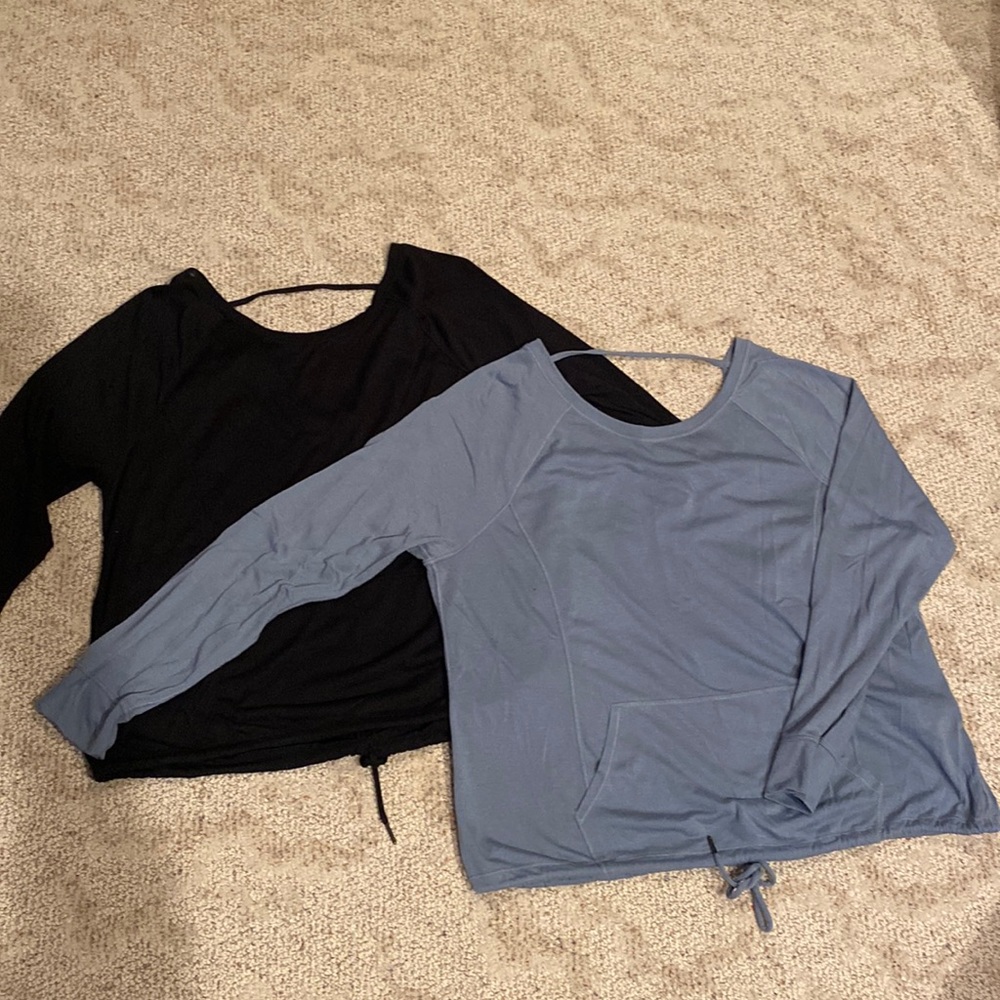 Calvin Klein Performance shirts with front pouch, drawstring waist, open back.